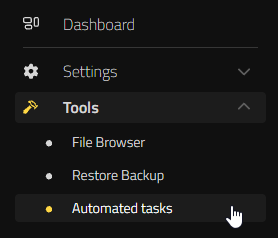 Navegar a Tareas Automatizadas en la sección Herramientas